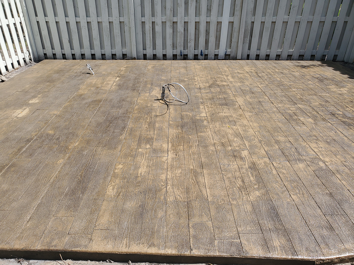 Residential stamped concrete – the look of real wood without the maintenance and hassle